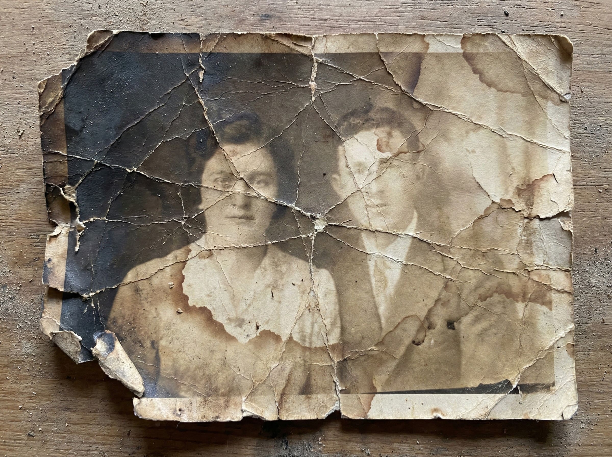 Old black-and-white wedding photo before restoration with scratches and reduced readability