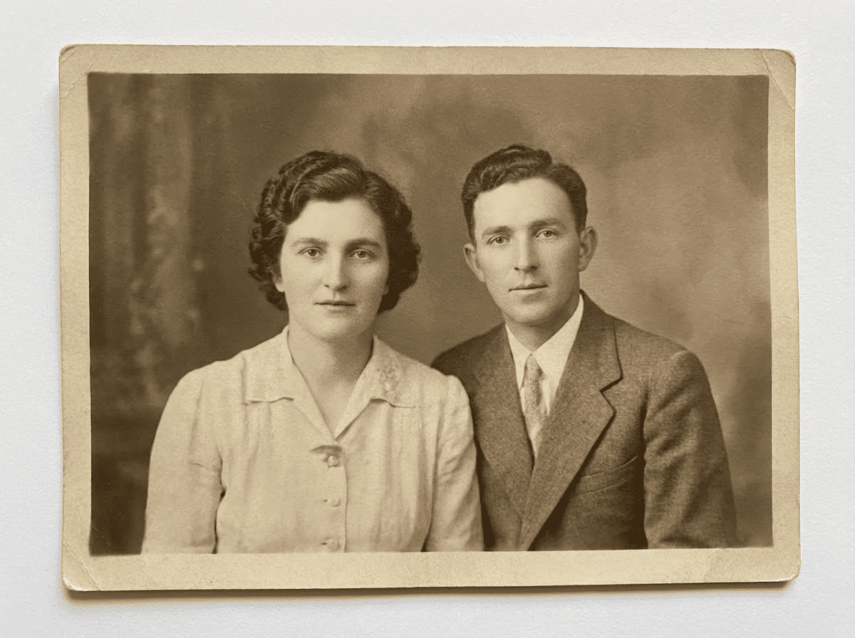 Colorized wedding photo after restoration with cleaner edges, flowers, and faces